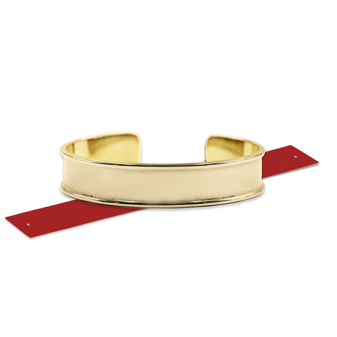 vue de face, côté lisse, en entier, à plat, pack bangle doré à l'or fin avec bande silicone rouge. Bande interchangeable, légères, souples, à mémoire de forme. Bracelet jonc en acier inoxydable. Ladygum, bijoux fantaisies en silicone, marque française, créateurs, designers. Idée cadeau pour les fêtes.